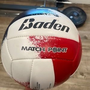Volleyball, it is very bouncy and the color are blue red and white